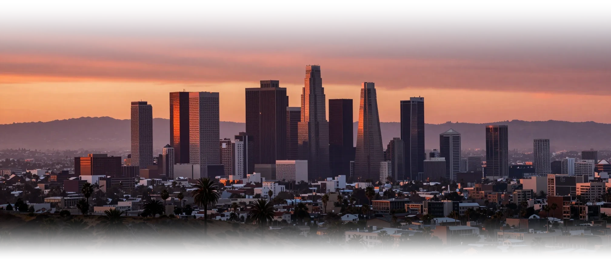 The Los Angeles skyline at sunset, seen from the hills